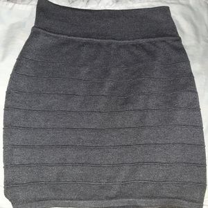 Joy Bandage Mini Skirt. Size Large. It is grey.